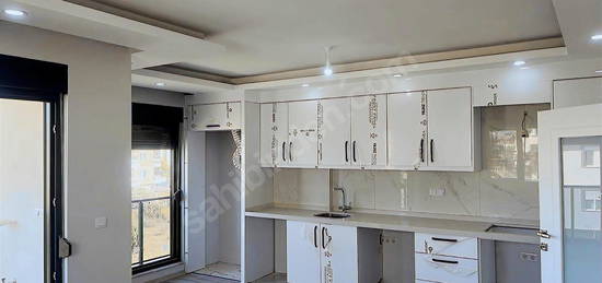 DÖŞEMEALTI YENİKÖY MAHALLESİ'NDE CADDE ÜZERİ SATILIK DAİRE