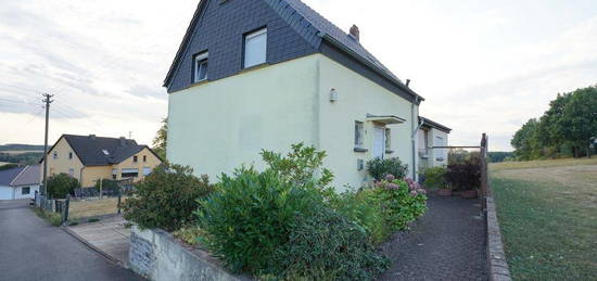 Einfamilienhaus mit Garten in idyllischer Lage