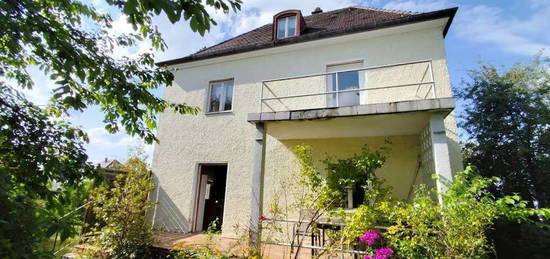 Einfamilienhaus mit Traumgarten in Stadtlage