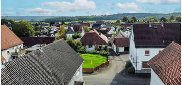 Einfamilienhaus mit vielseitig nutzbaren Nebengebäuden in Grünberg - Weickartshain