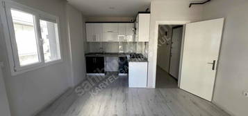 KARYELDEN BORNOVA MERKEZDE 2+1 AMERİKAN MUTFAK KİRALIK DAİRE