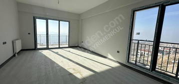 KARYELDEN BAYRAKLIDA DENİZ MANZARALI KİRALIK 2+1 100m2 DAİRE