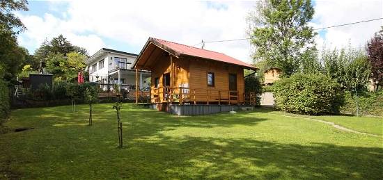 Kleingarten - Grundstück - mit neuwertigem Holzhaus -ganzjähriges Wohnen