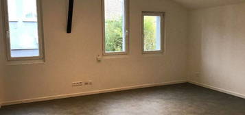 Appartement F2 style loft 55m² limite Neuville en ferrain