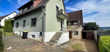 -- Zweifamilienhaus mit Einfamilienhausanbau --