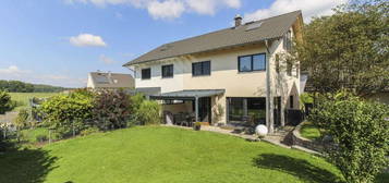 Modernes Einfamilienhaus mit Garten, Garage und Carport in Seenähe