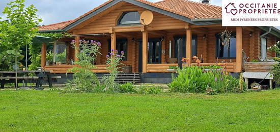 Maison en bois magnifiquement située, neutre en CO2 avec une