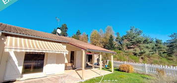 Maison mitoyenne avec garage et terrain