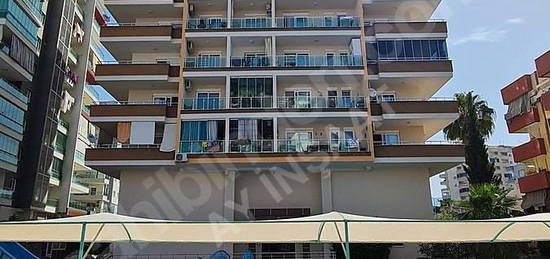 ALANYA MAHMUTLAR MERKEZDE EŞYALI SATILIK 1+1 DAİRE