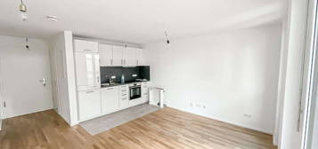 Neuwertige und helle 2 Zimmer-Wohnung mit Balkon, EBK und TG-Stellplatz