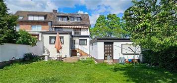 Ein Haus mit vielen Möglichkeiten auf schönem Areal in Süd-Westlage von Siegburg.