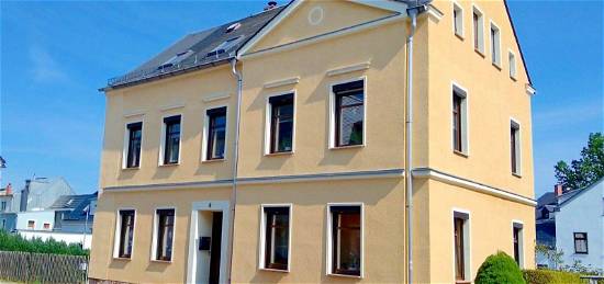 Charmantes freistehendes Mehrfamilienhaus mit Terrasse und Grünfl