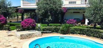 Villa a pochi km da Porto Pino residence piscina