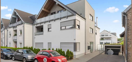 Traumhafte Penthouse-Atmosphäre: Stilvolle Wohnung mit Aufzug und Garage im Zentrum von Pulheim