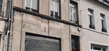 Appartement sur grand Garage (ancienne maison)