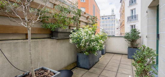 Coup de coeur - Superbe loft 4 pièces de 93m2 traversant - Terrasse de 15m2 - Passage Turquetil 75011 Paris