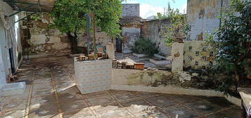 Casa adosada en calle Roelas en Olivares