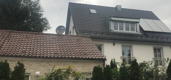 Mehrfamilienhaus mit Gewerbeeinheit in München