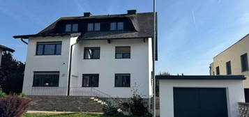 Großzügiges Mehrfamilienhaus in Leopoldsdorf - Höchstes Haus der Umgebung mit einzigartigem Fernblick