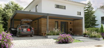 Das Stadthaus mit Anbau und Carport.