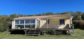 Maison avec véranda, garage et jardin