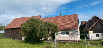 Günstiges und stark renovierungsbedürftiges Einfamilienhaus mit Scheune, Sandsteinkeller und Brunnen