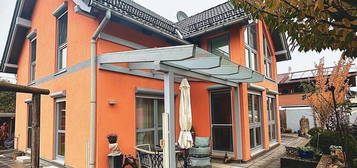 Charmantes, gepflegtes Einfamilienhaus mit einladender Terrasse und  liebevoll gestalteter Umgebung