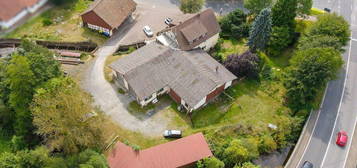 Großzügiges Zweifamilienhaus mit Wasserrecht und attraktiven Mieteinnahmen in Schmalnau