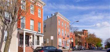 For Rent: Charming Urban Living at 105 N Chester Street Your City Retreat Awaits!, 105 N Chester St #1, Baltimore, MD 21231