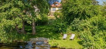 Stilvolle Landvilla mit fantastischem Seeblick, Ufergrundstück und Bootssteg am Schwielowsee