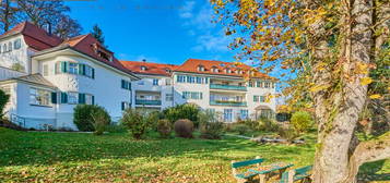 Exklusive Dachgeschosswohnung in historischem Gebäude mit Alpenblick!