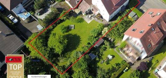 Mehrfamilienhaus mit großem Garten in Korntal: Ein Paradies für Familien