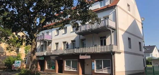 Mehrfamilienhaus mit 8 Wohneinheiten, 2 Läden und Carport-Plätzen – Voll vermietet im Minden