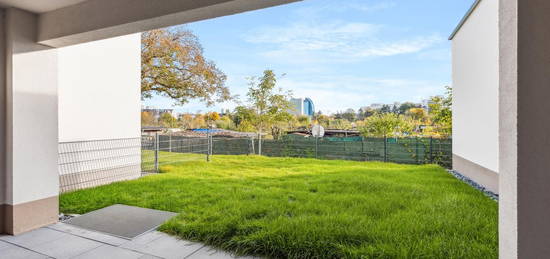 Gartenwohnung mit Skyline-Blick - Erstbezug im Effizienzhaus 40