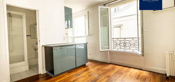 Appartement 29m2, rez-de-chaussée, entièrement sur cour, rue