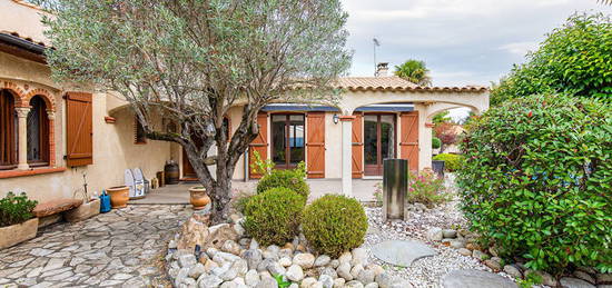 Maison traditionnelle et son jardin paysagé avec piscine à Toulouse