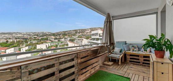 Appartement 3 Pièces (88m²) Traversant avec Vue Mer et Double Garage à Marseille