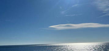 Mansardato con terrazza fronte mare