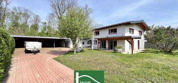 Spacious, low-energy house with an additional office/practice or apartment of 70 m². Completely renovated in 2023.