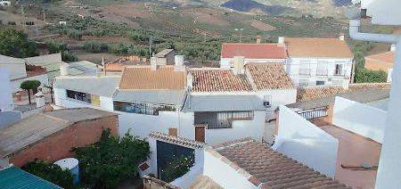 Casa adosada en calle Acera del Sol en Colmenar