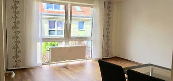 Erstklassige 2-Zimmer-Wohnung bei U6 inkl. Garage mit Gartenblick