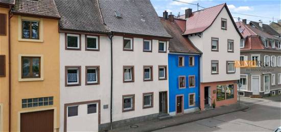 IMMORath.de - Charmantes Mehrfamilienhaus mit zwei Terrassen