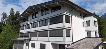 Dachgeschosswohnung mit alpinem Charakter - Erstbezug