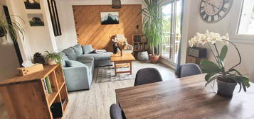 Appartement T4 traversant avec balcon, garage et cave