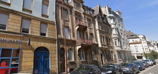 EXCLUSIF : Splendide Appartement Haussmannien en Duplex avec Rendement Locatif