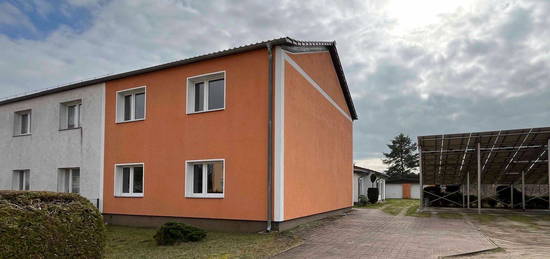 Familienidyll mit vermieteter ELW, großem Garten und Bauplatz in Lutherstadt Wittenberg OT Abtsdorf