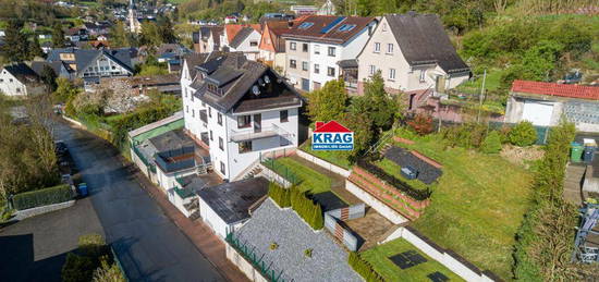 ++ KRAG Immobilien ++ Perfekt für 2 Generationen: Gepflegt, Doppelgarage, Studio, 4 Balkone, Werkstatt ++