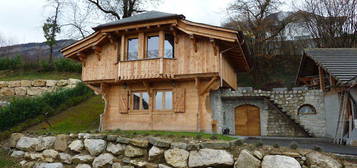 A louer à Bossey un mignon chalet meublé écologique - 69m2 - 2 chambres - parking - Cave