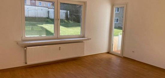 Erdgeschosswohnung mit Balkon und Tageslichtbad