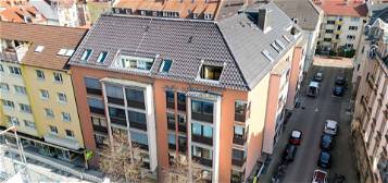Sonniges Refugium in der Heidelberger Weststadt: Dachgeschosswohnung mit Fahrstuhl, Tiefgaragenstellplatz und 2 Dachterrassen!
